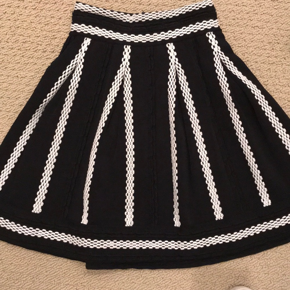 MAJE black skirt with white accent.